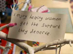 Message from volunteer reads 'I enjoy helping women get the support they deserve'